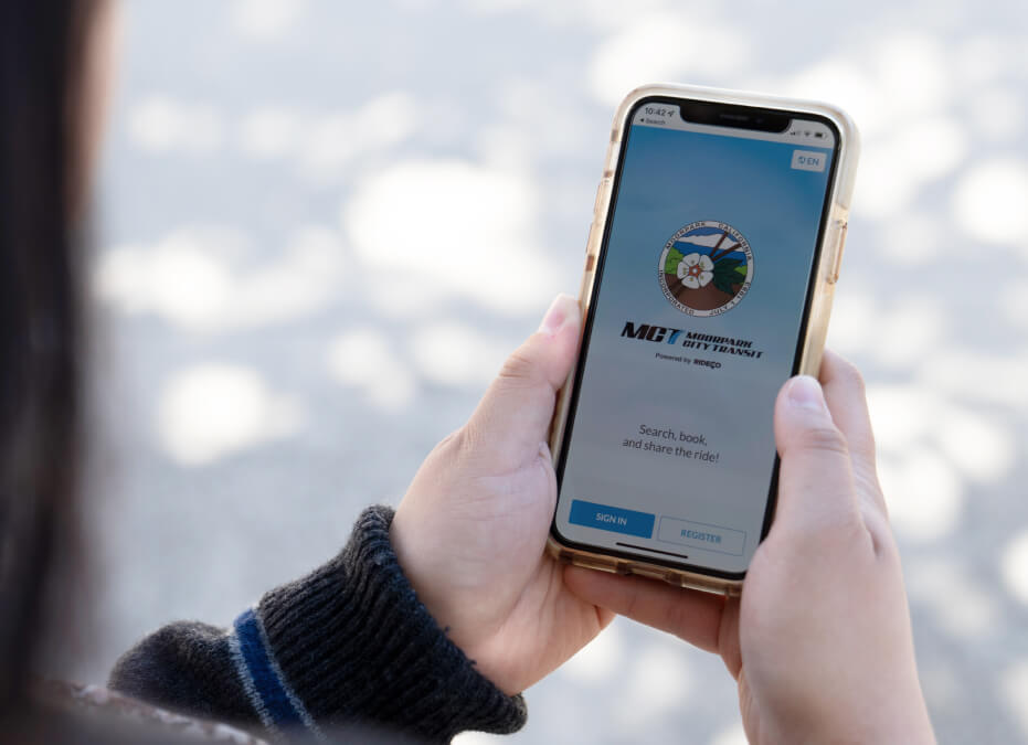 Person using the City of Moorpark Transit mobile app